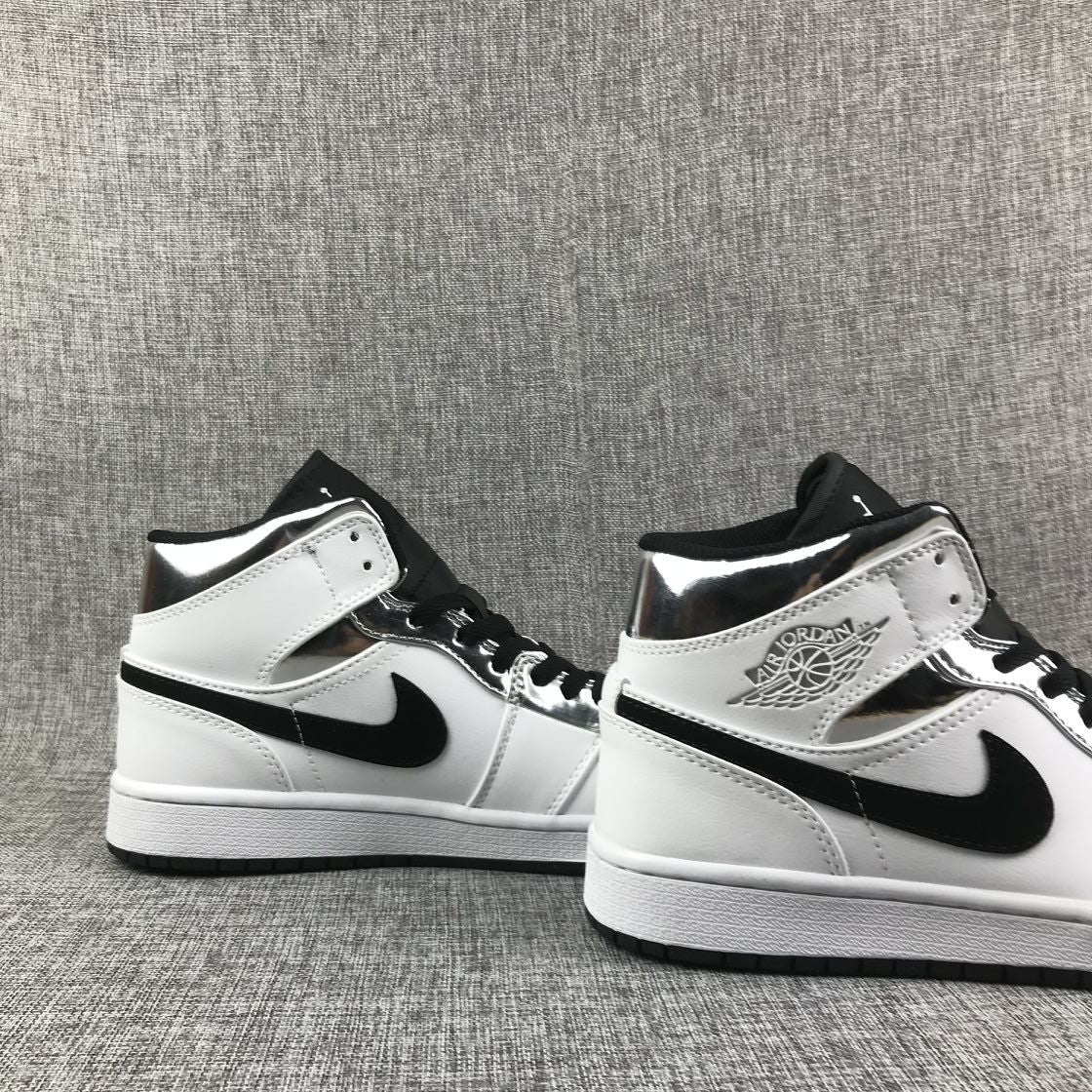 Air Jordan 1 Mid White and Black Sneakers