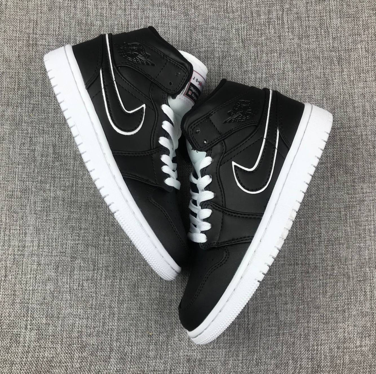 Air Jordan 1 Mid Black and White Sneakers 852542-016