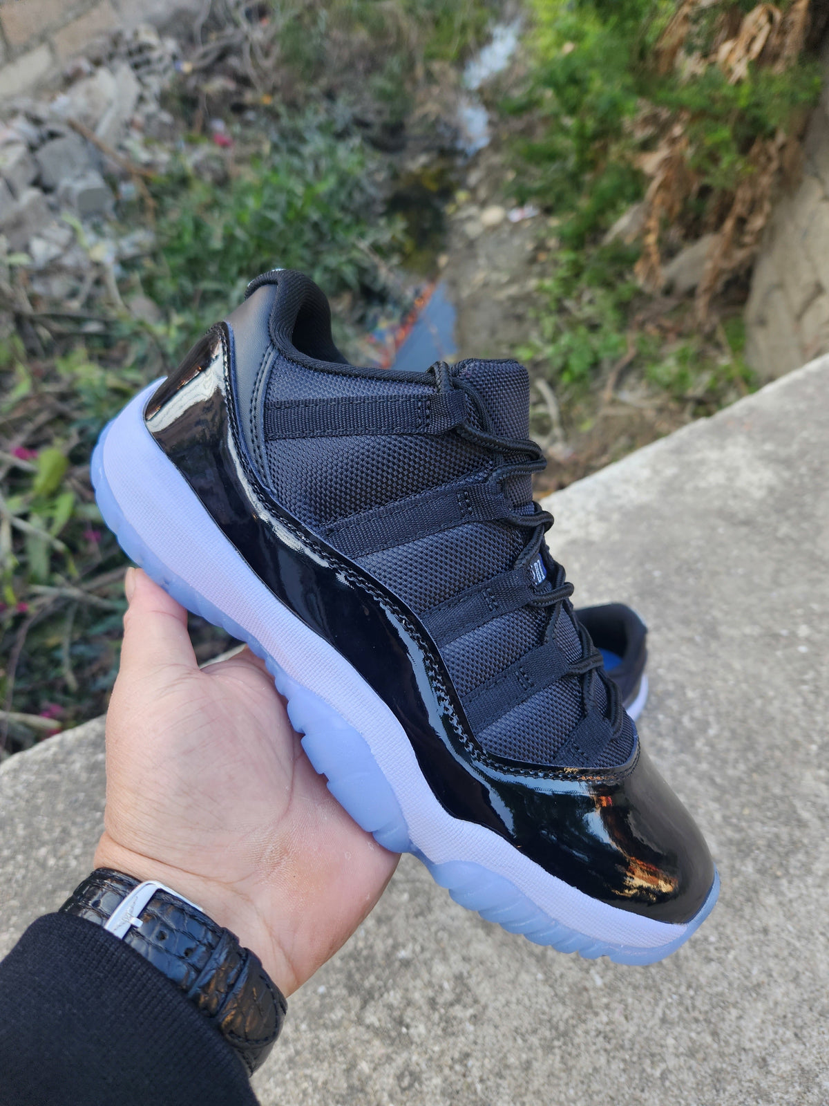 Air Jordan 11 Low Black and White Sneakers