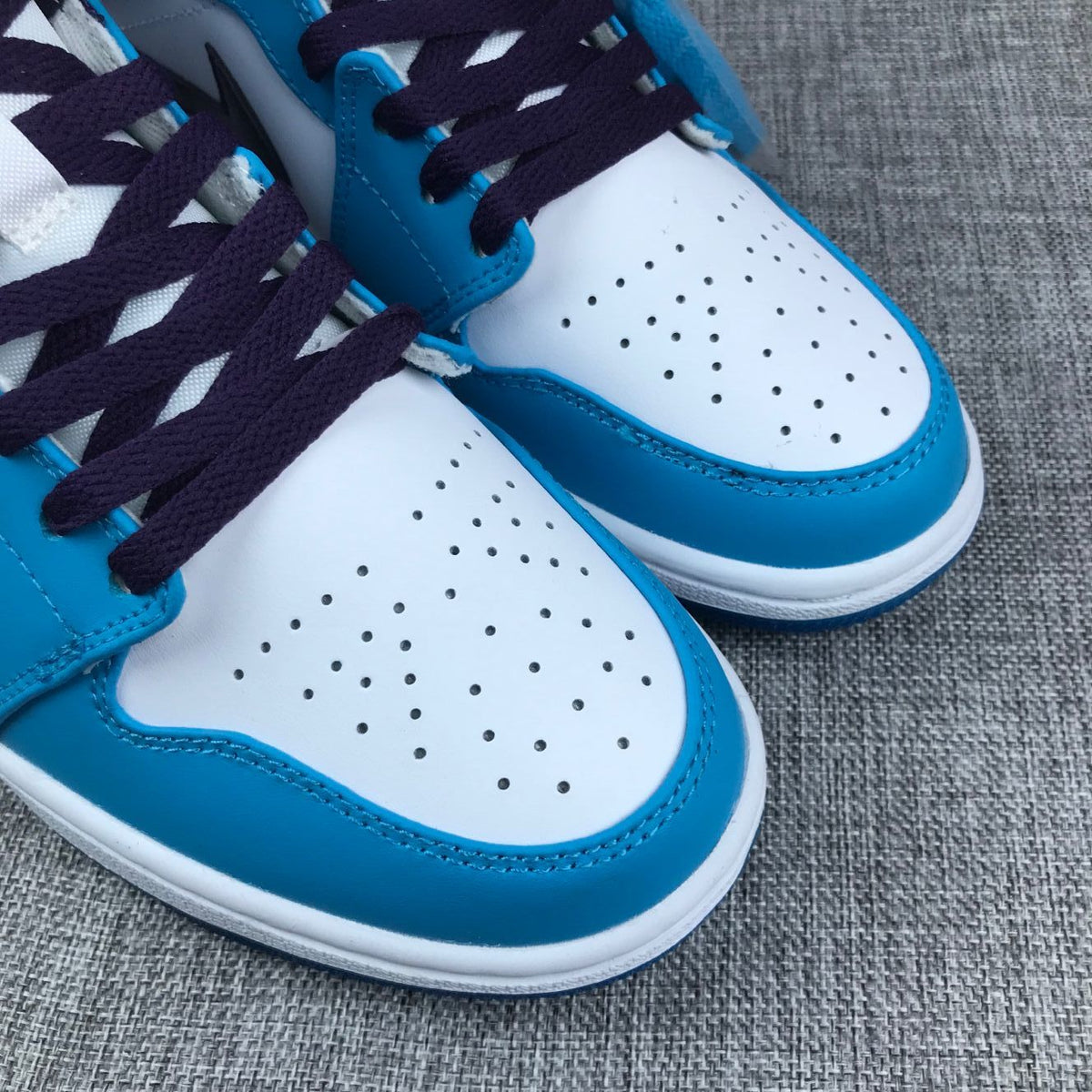 Air Jordan 1 Mid Sneakers in Blue, White and Black