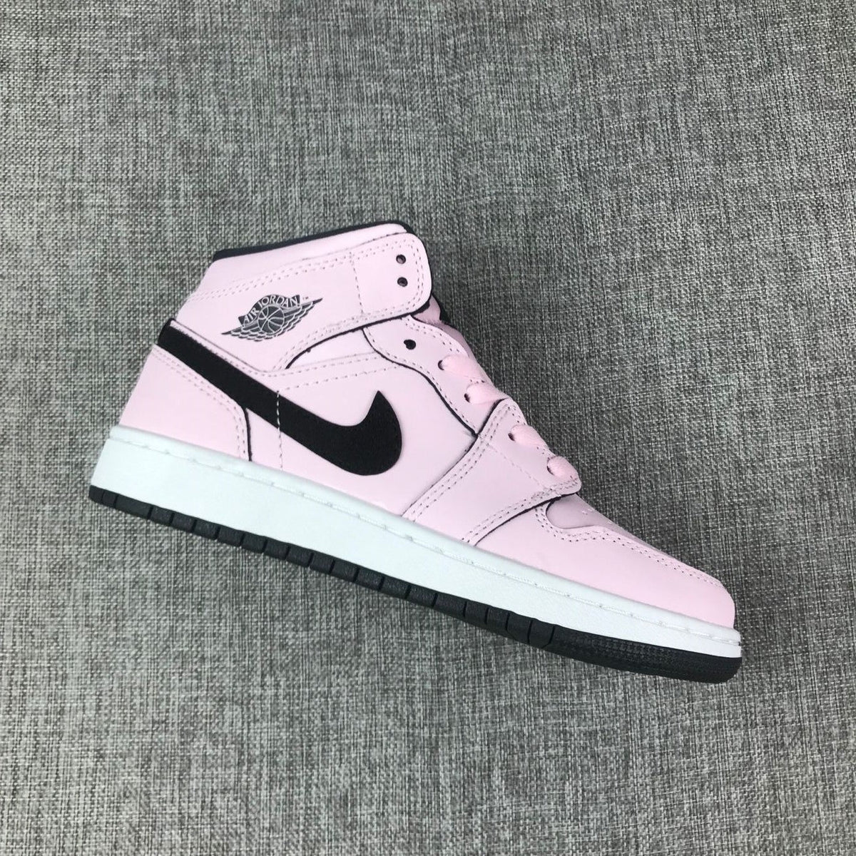 Air Jordan 1 Mid Pink and Black High-Top Sneakers