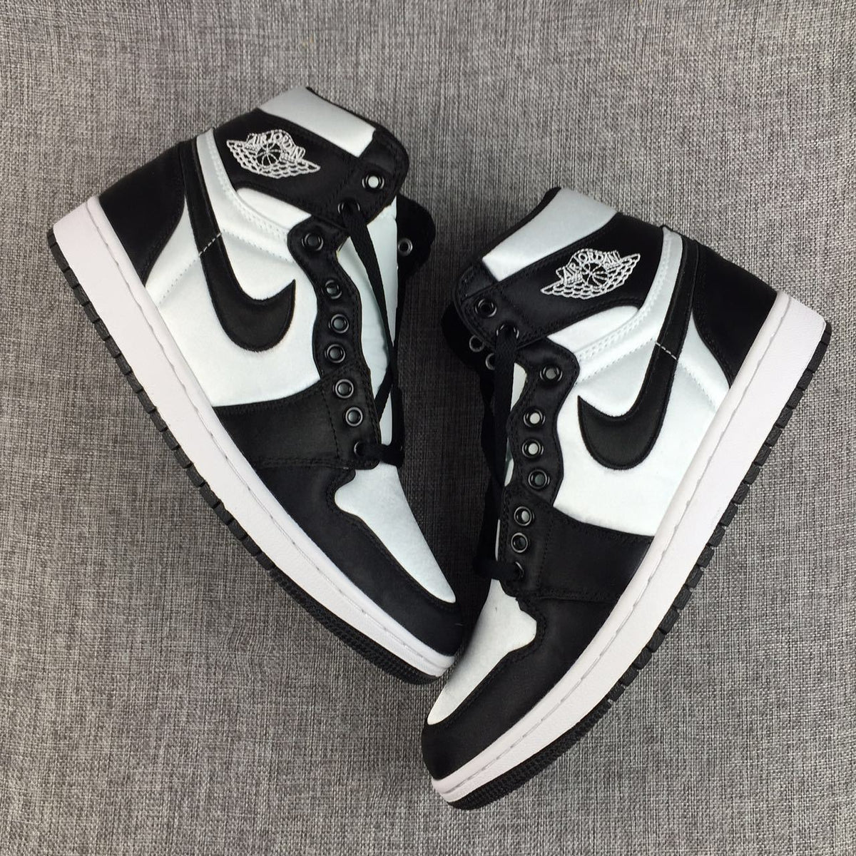 Air Jordan 1 High Black and White Satin-Style Sneakers
