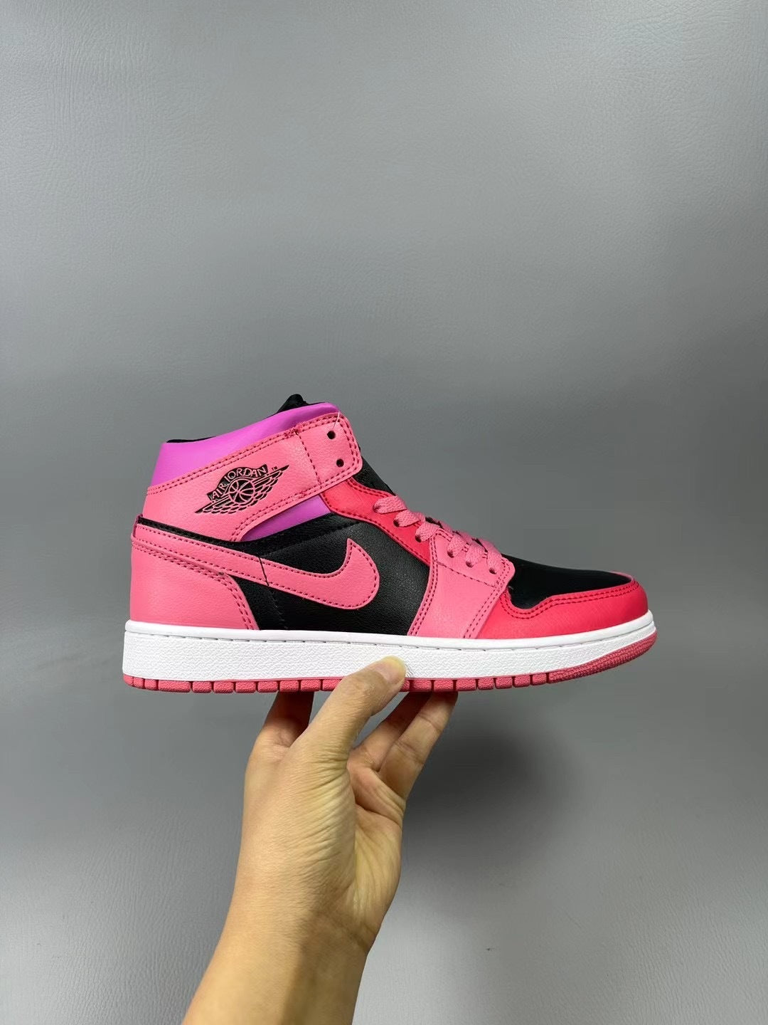 Jordan 1 Mid Pink and Black High-Top Sneakers