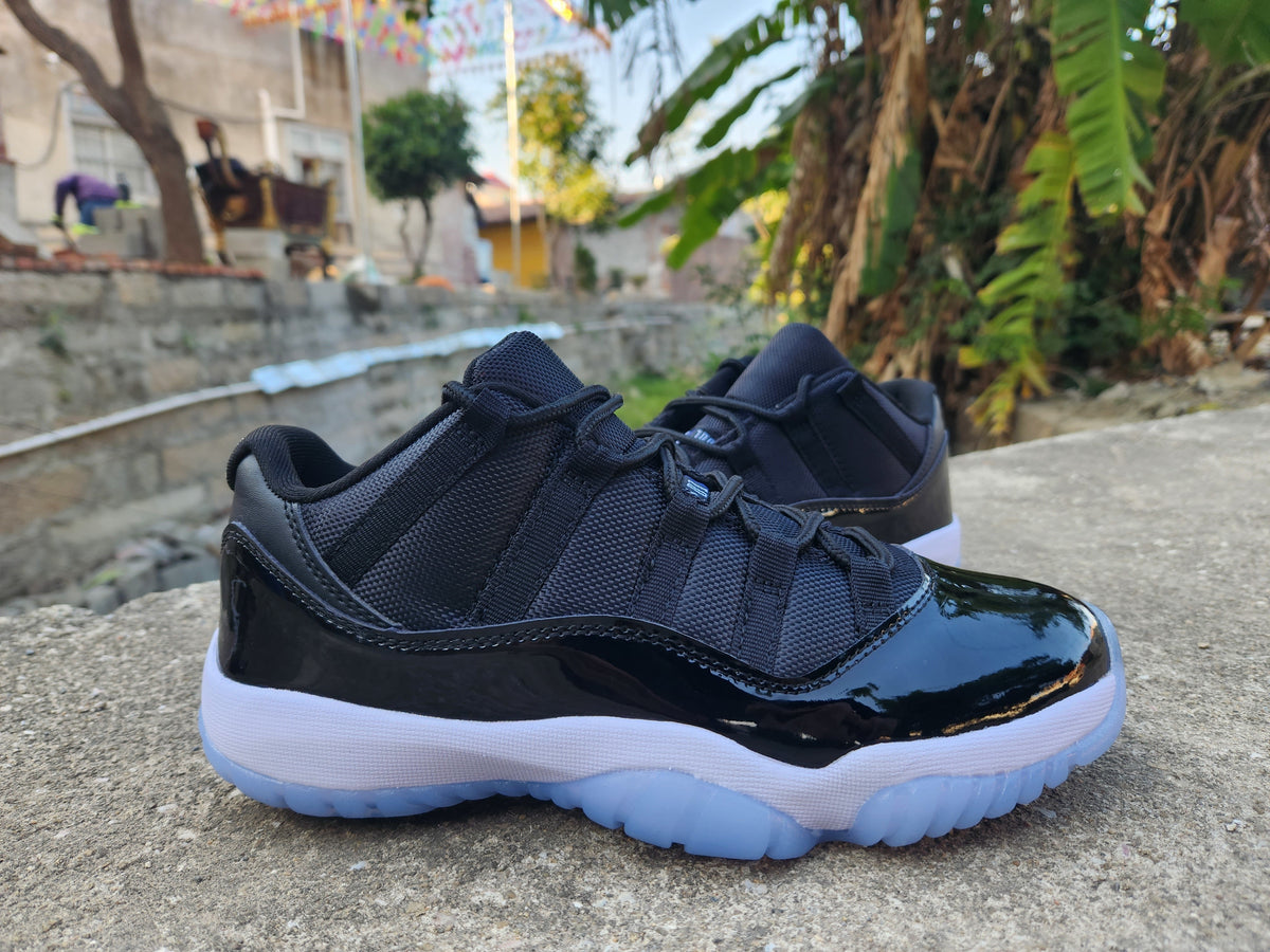 Air Jordan 11 Low Black and White Sneakers