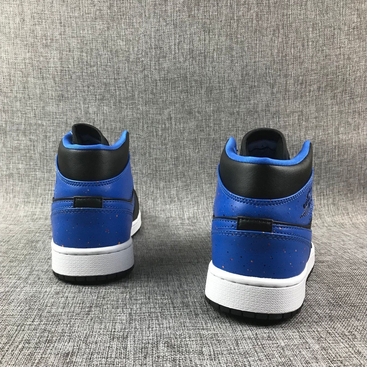 Air Jordan 1 Mid Black and Blue High-Top Sneakers