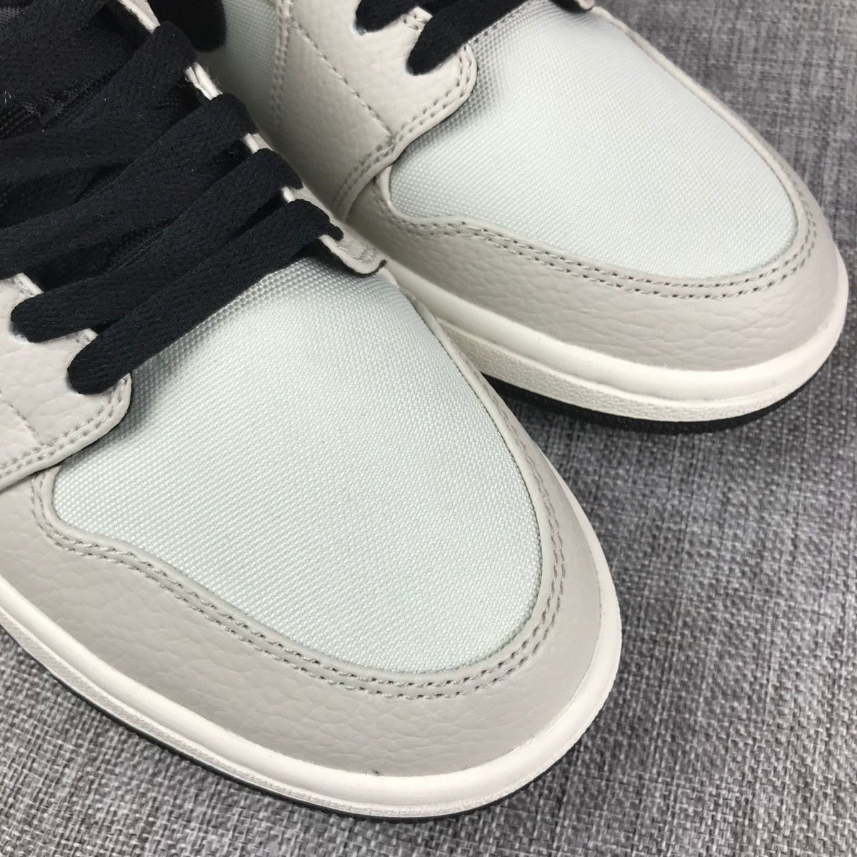 Air Jordan 1 Mid Grey and Black High-Top Sneakers