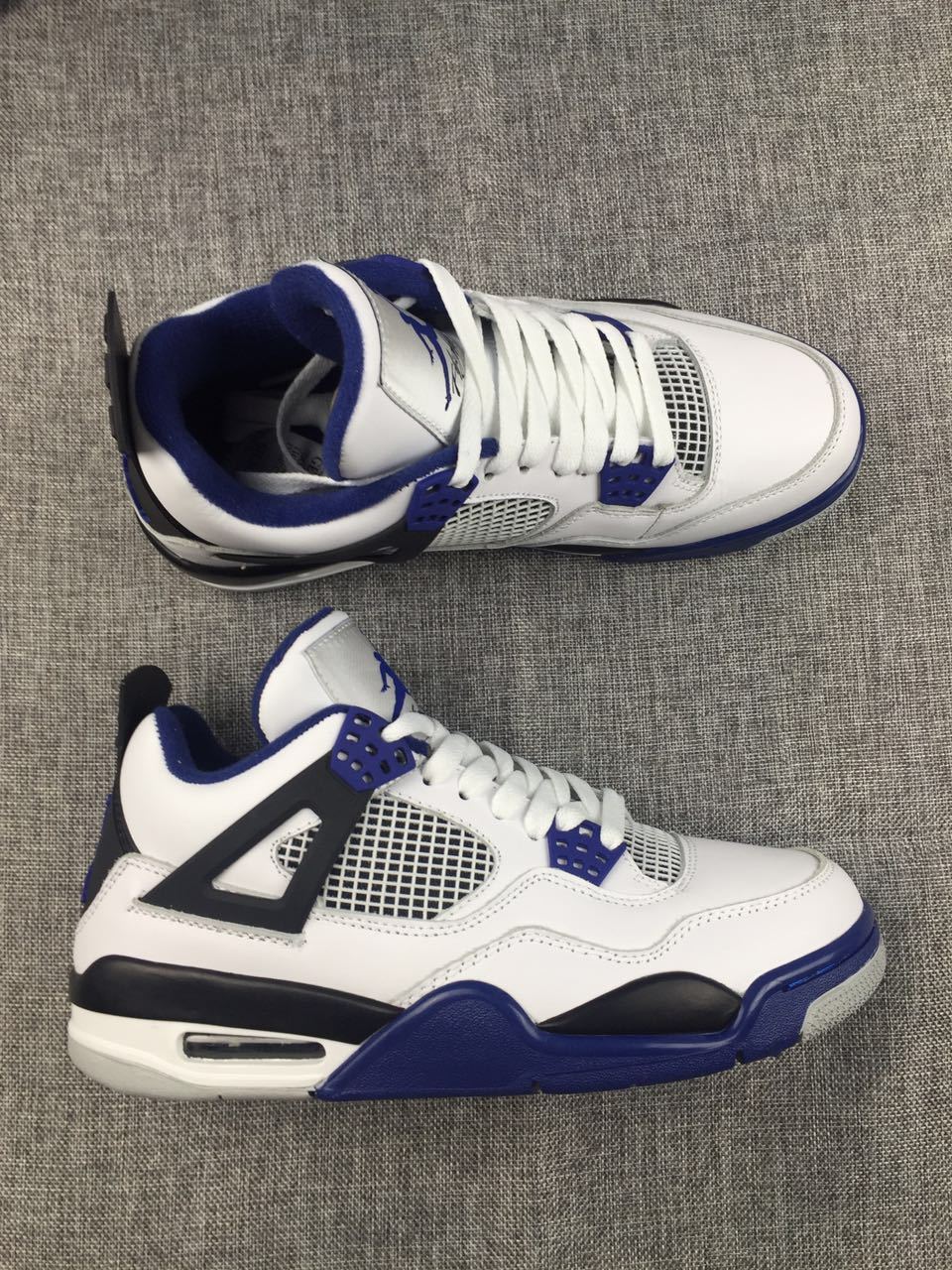 Jordan Air Jordan 4 Sneakers in White, Black and Blue