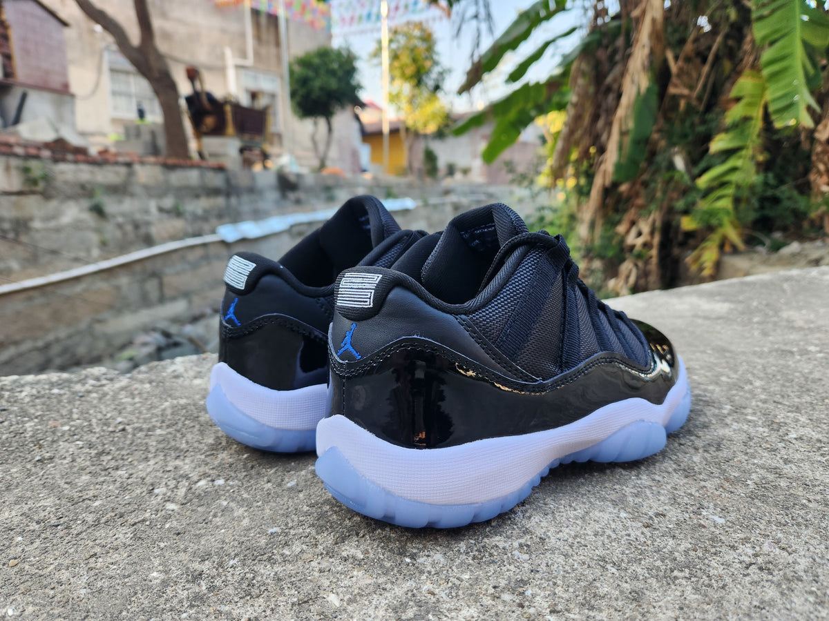 Air Jordan 11 Low Black and White Sneakers
