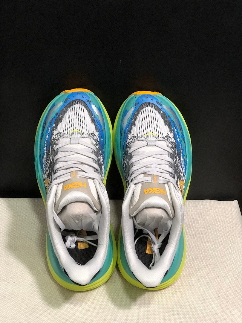 HOKA Stinson 7 Trail Sneakers in Blue and Lime