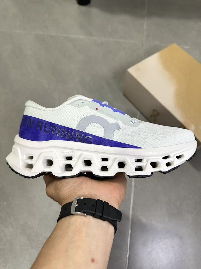 On Running Sneakers in White and Purple