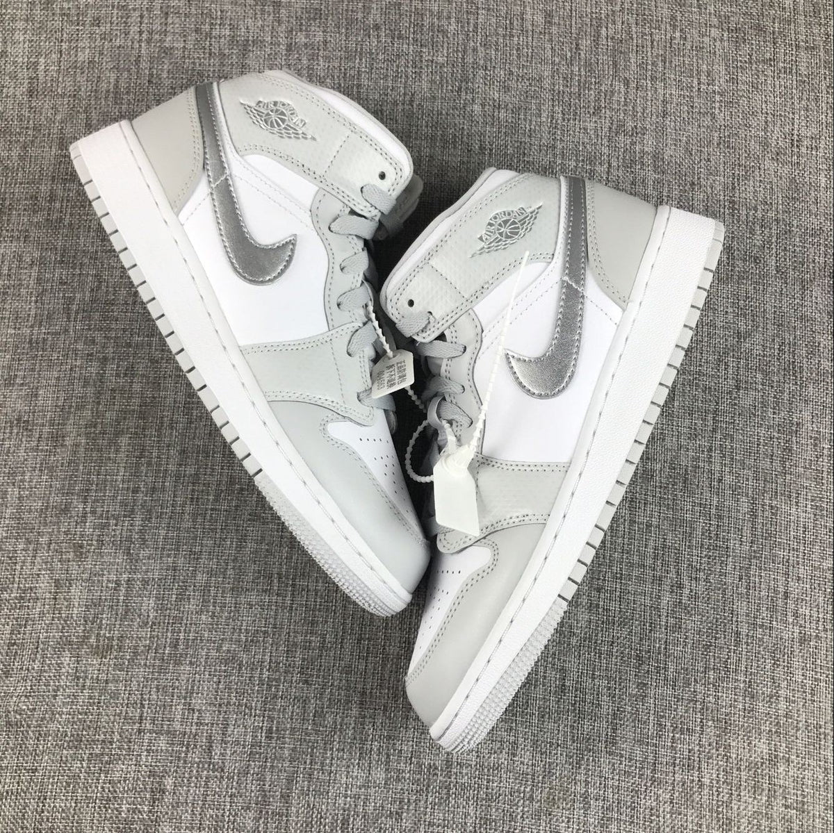 Jordan Air Jordan 1 Mid GS White and Silver Sneakers