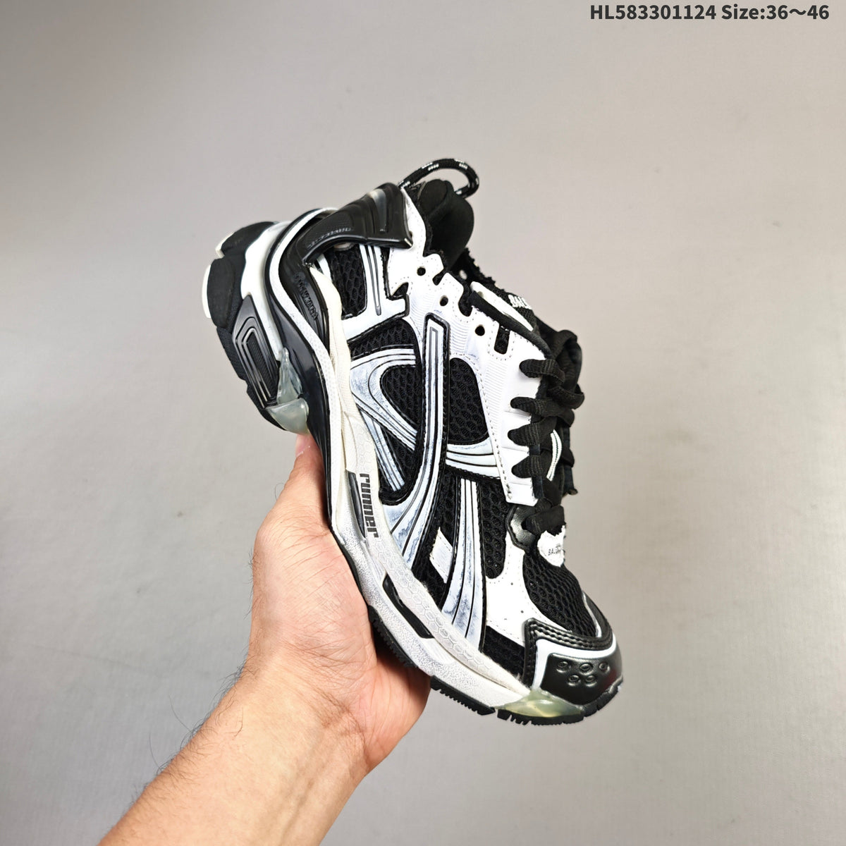 Balenciaga Runner Low-Top Sneakers in Black and White