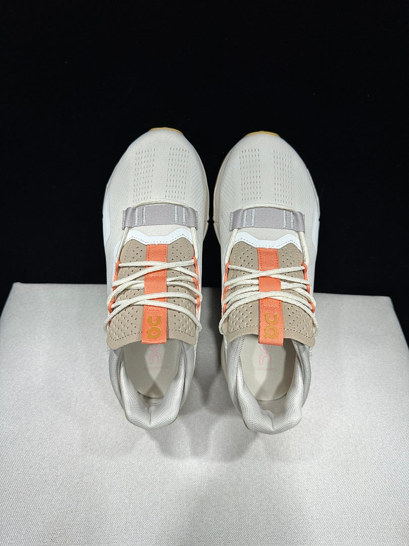 On Cloudnova 2 Sneakers in Ivory and Orange