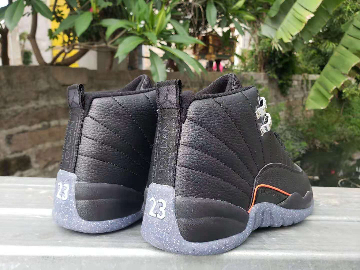 Jordan 12 High-Top Sneakers in Black with Speckled Sole