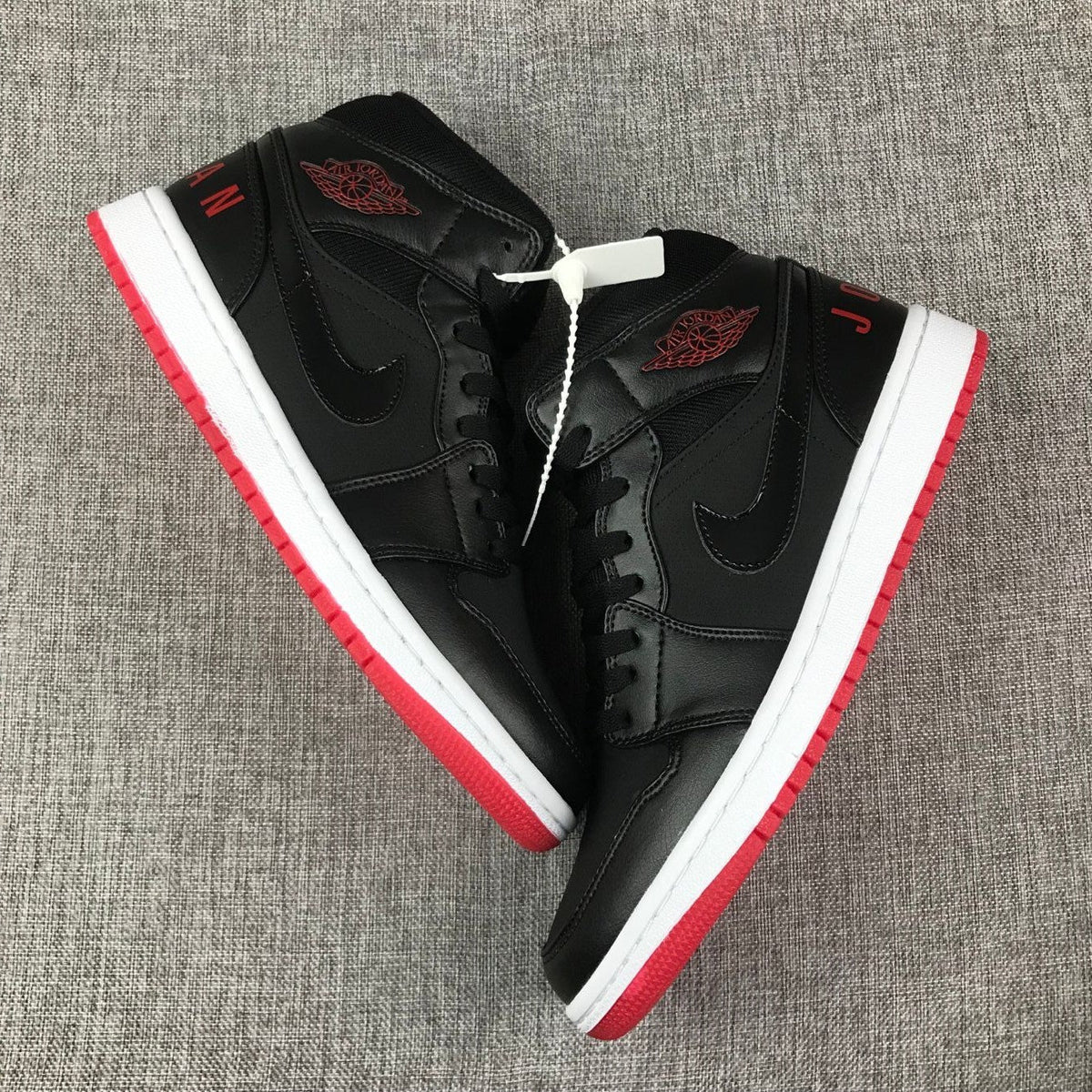 Air Jordan 1 Mid Black Red White High-Top Sneakers