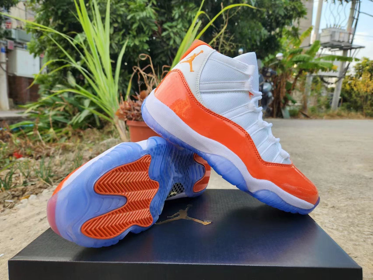 Jordan 11 White and Orange High-Top Sneakers