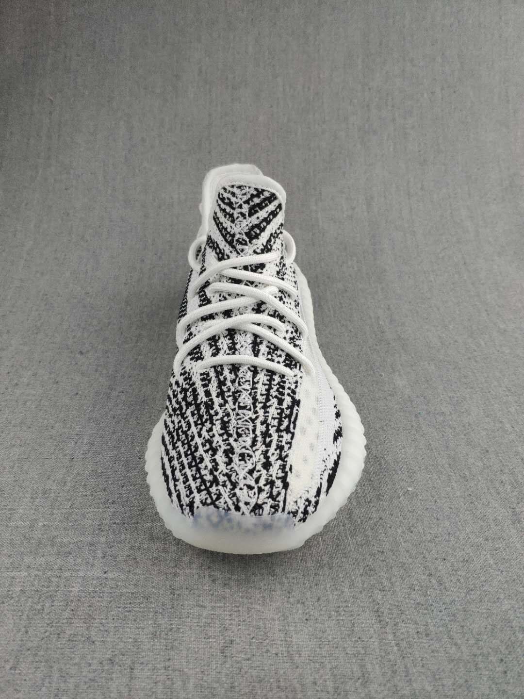 Yeezy 350 V2 Knit Sneakers in Black and White