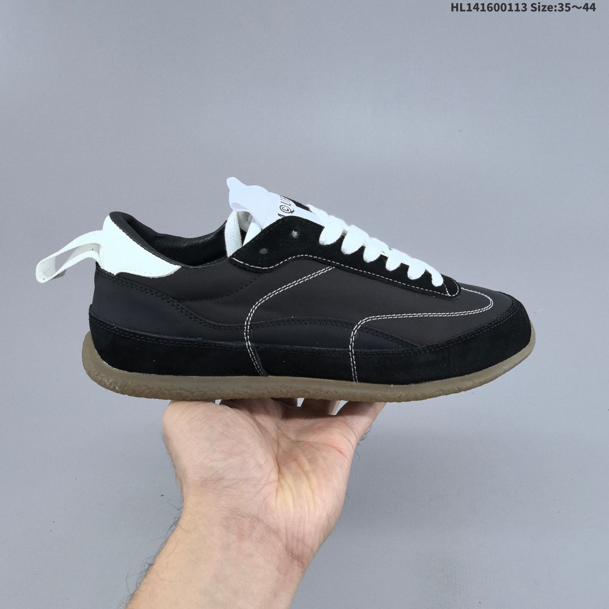Miu Miu Tyre Low-Top Sneakers in Black or White