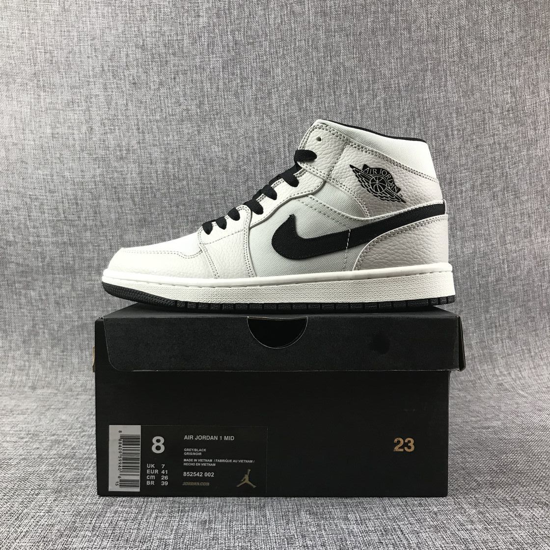 Air Jordan 1 Mid Grey and Black High-Top Sneakers