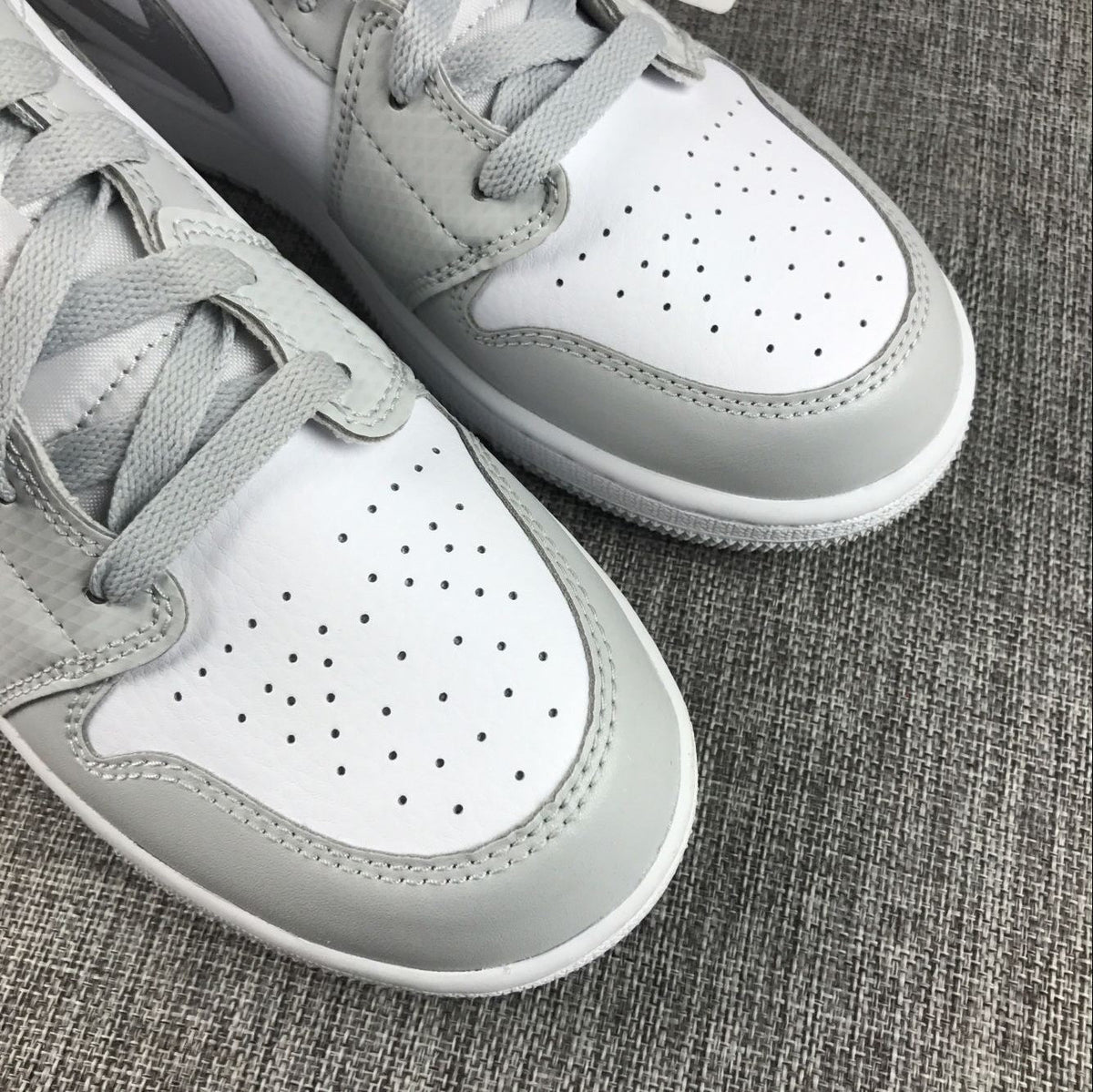 Jordan Air Jordan 1 Mid GS White and Silver Sneakers