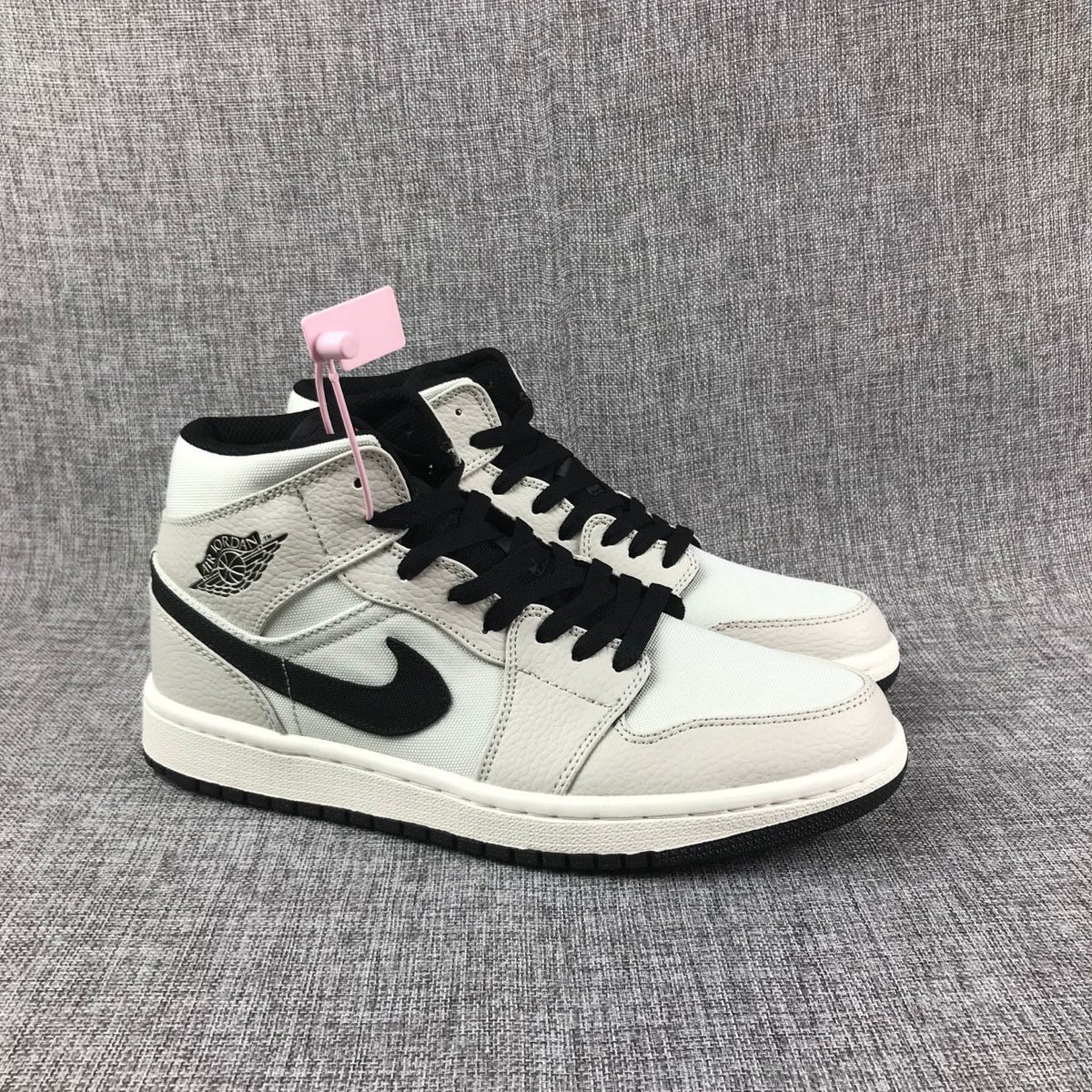 Air Jordan 1 Mid Grey and Black High-Top Sneakers