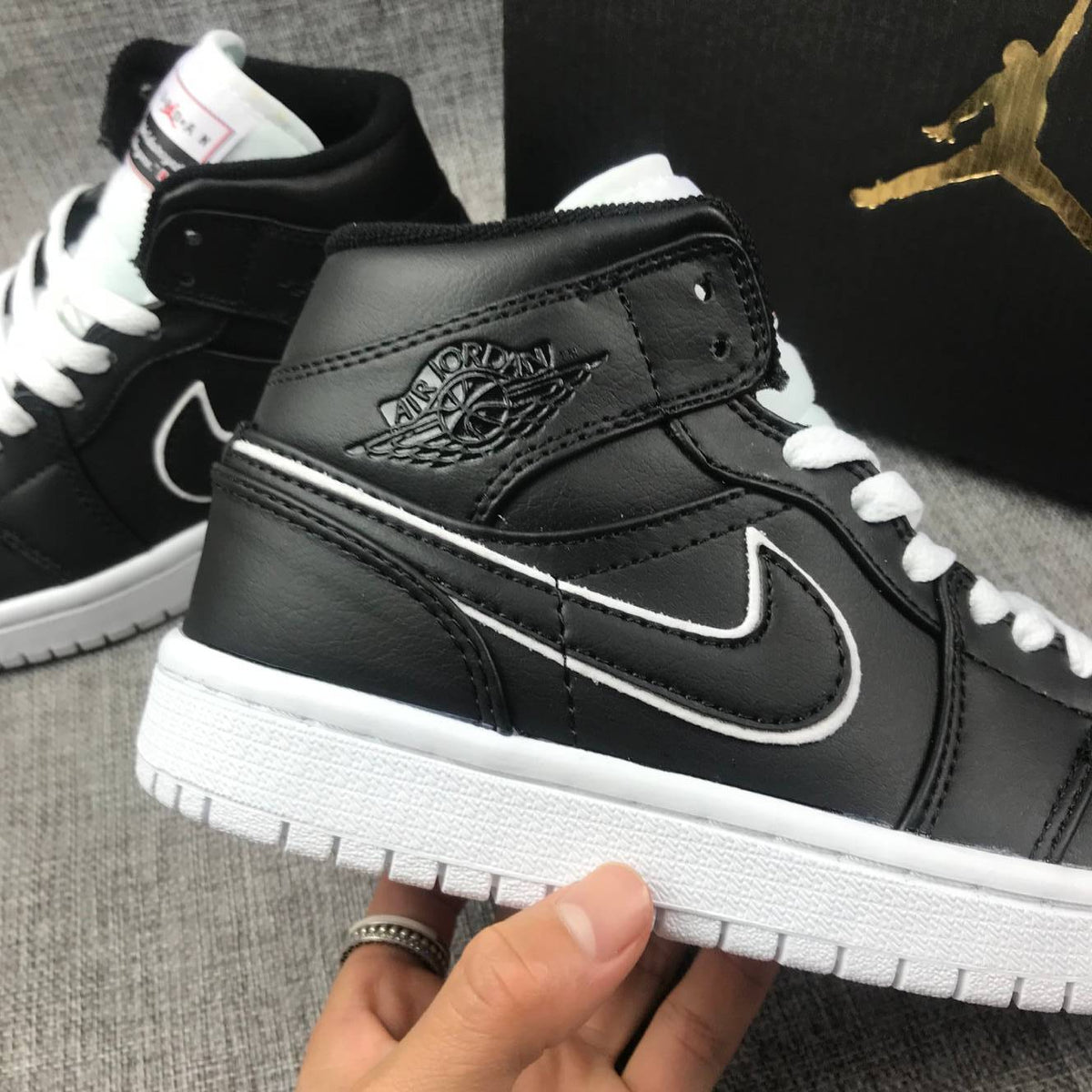 Air Jordan 1 Mid Black and White Sneakers 852542-016