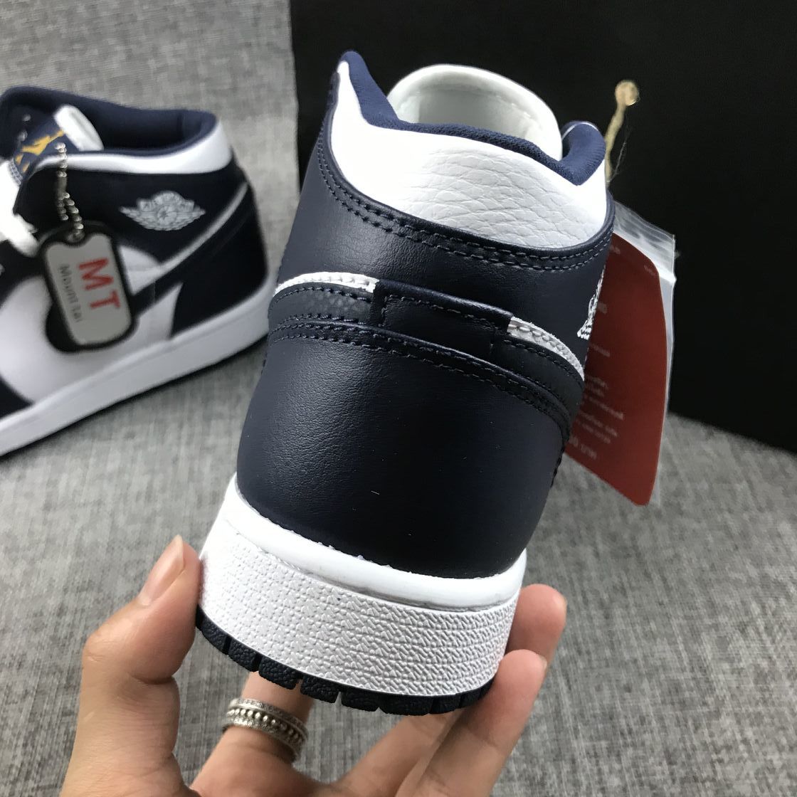 Jordan 1 Mid What The Obsidian Sneakers 554724-174