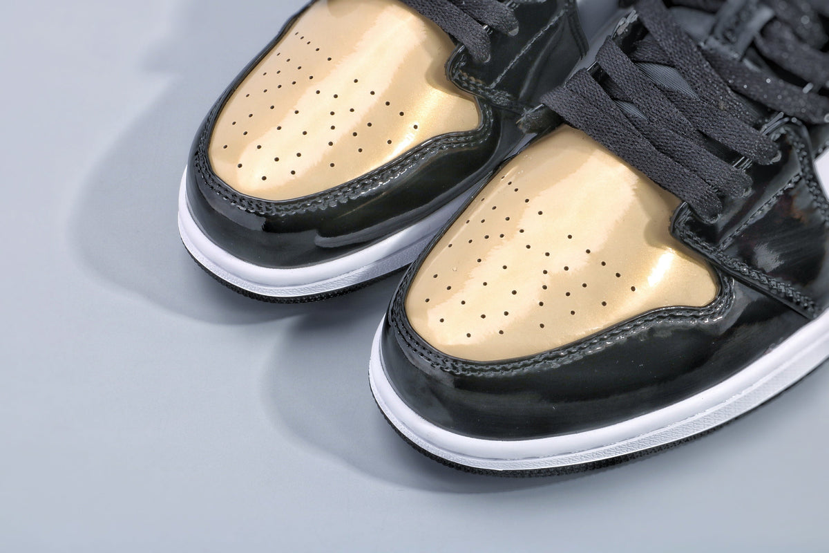 Jordan 1 Low Gold Toe Black and Metallic Gold Sneakers