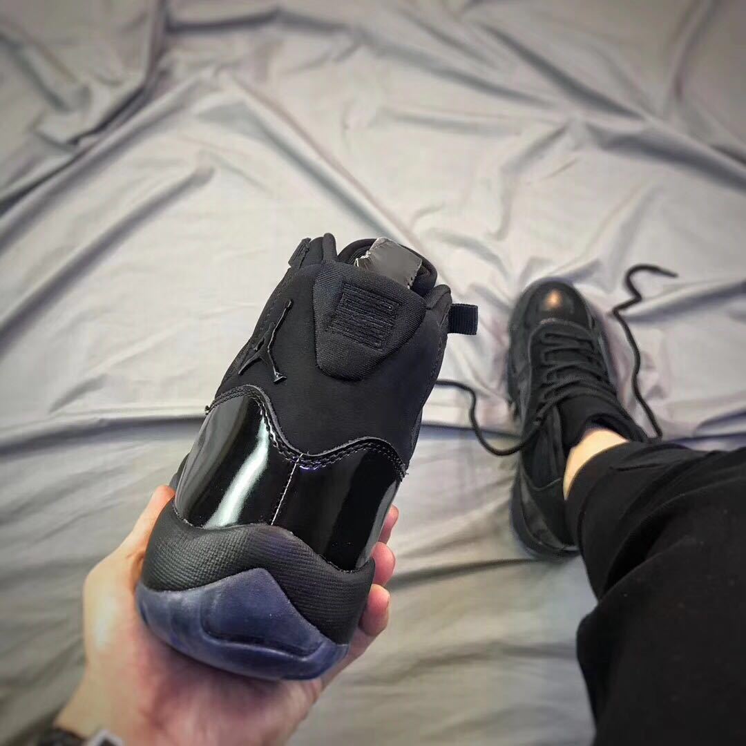 Air Jordan 11 Cap and Gown Black High-Top Sneakers