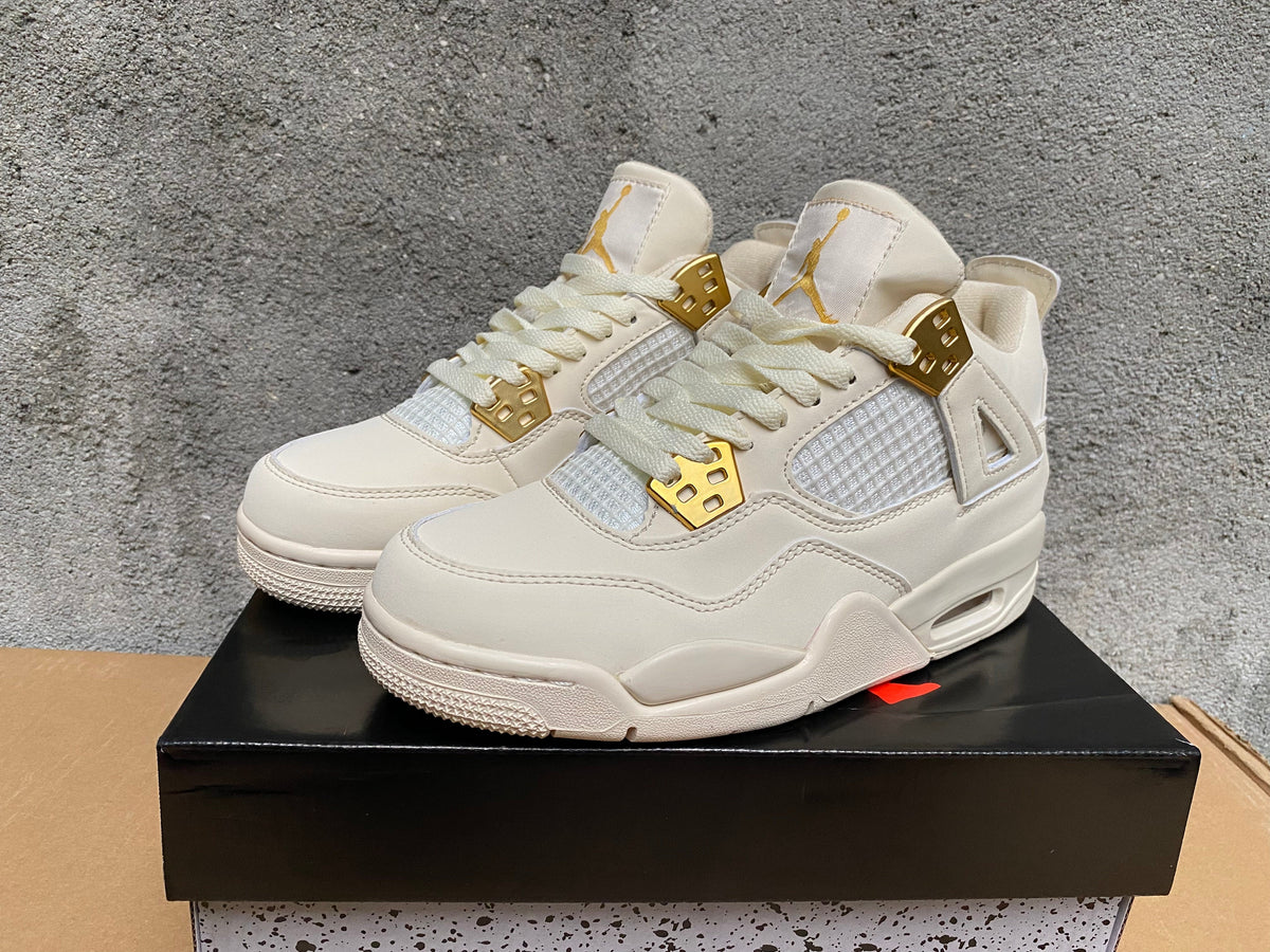 Jordan 4 Retro Sneakers in Ivory and Black Pink