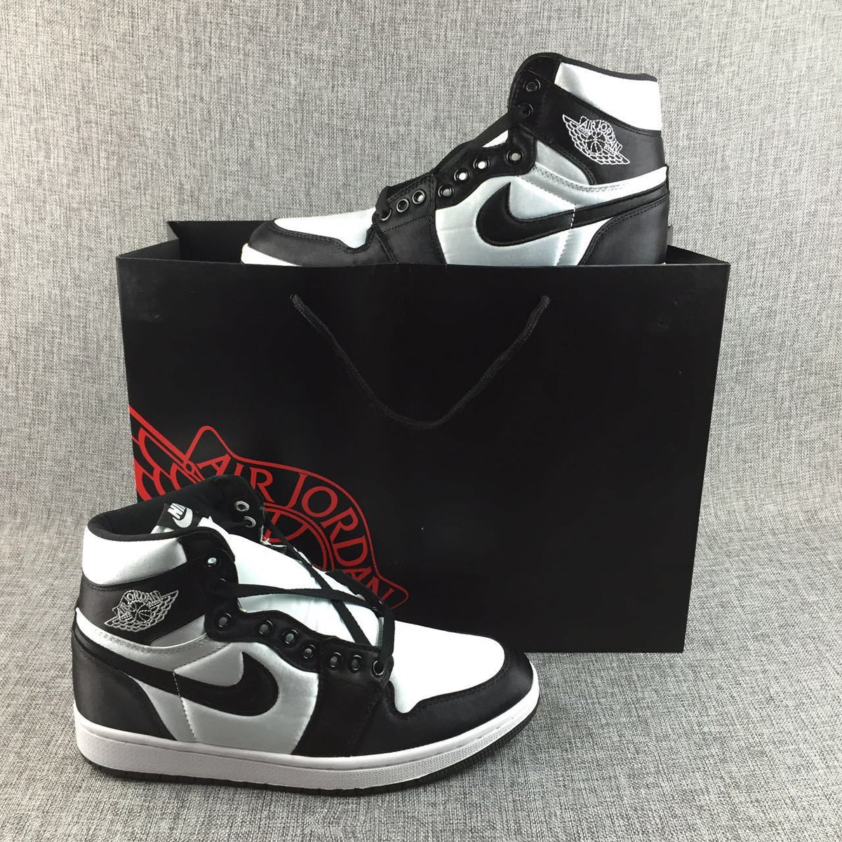 Air Jordan 1 High Black and White Satin-Style Sneakers