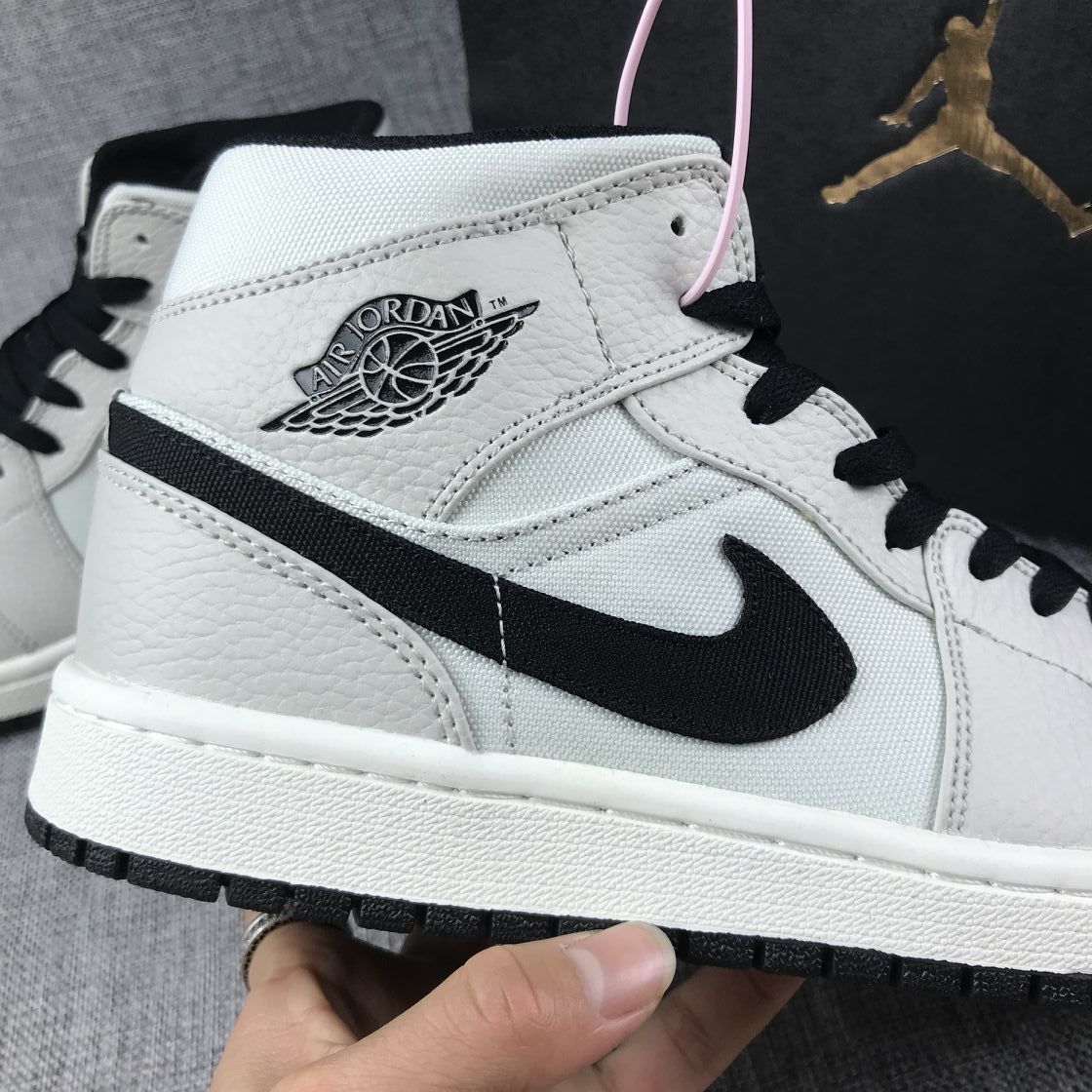 Air Jordan 1 Mid Grey and Black High-Top Sneakers