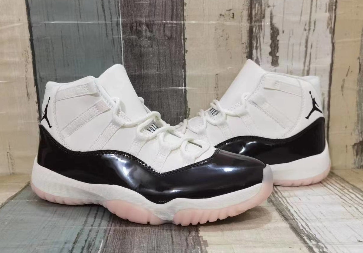 Jordan 11 High-Top Sneakers in White and Black