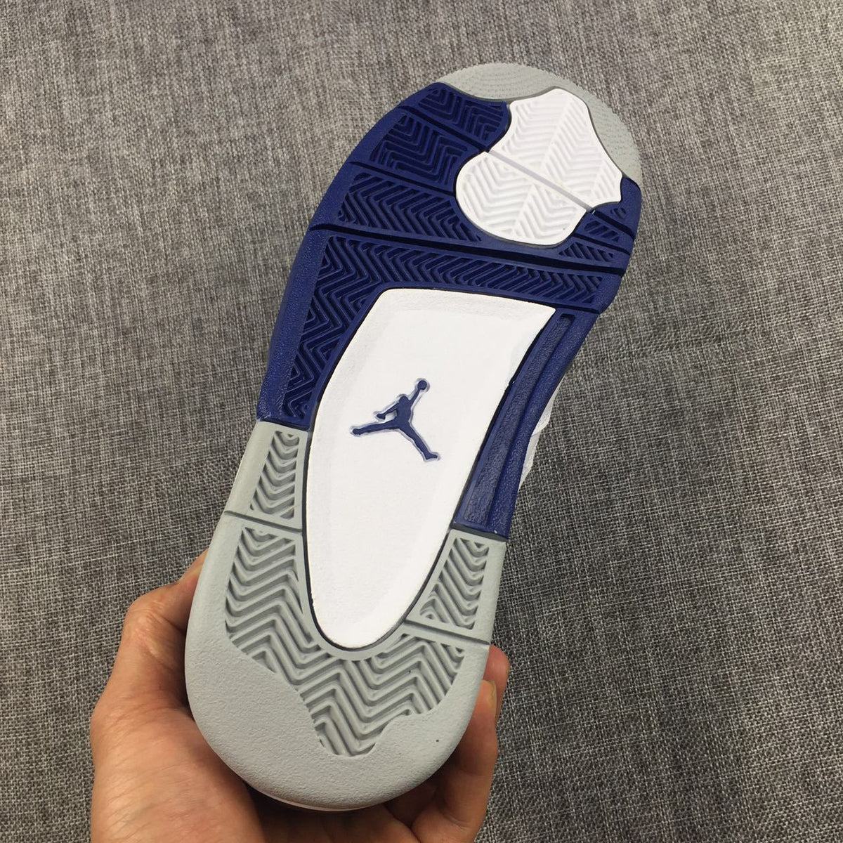 Jordan Air Jordan 4 Sneakers in White, Black and Blue