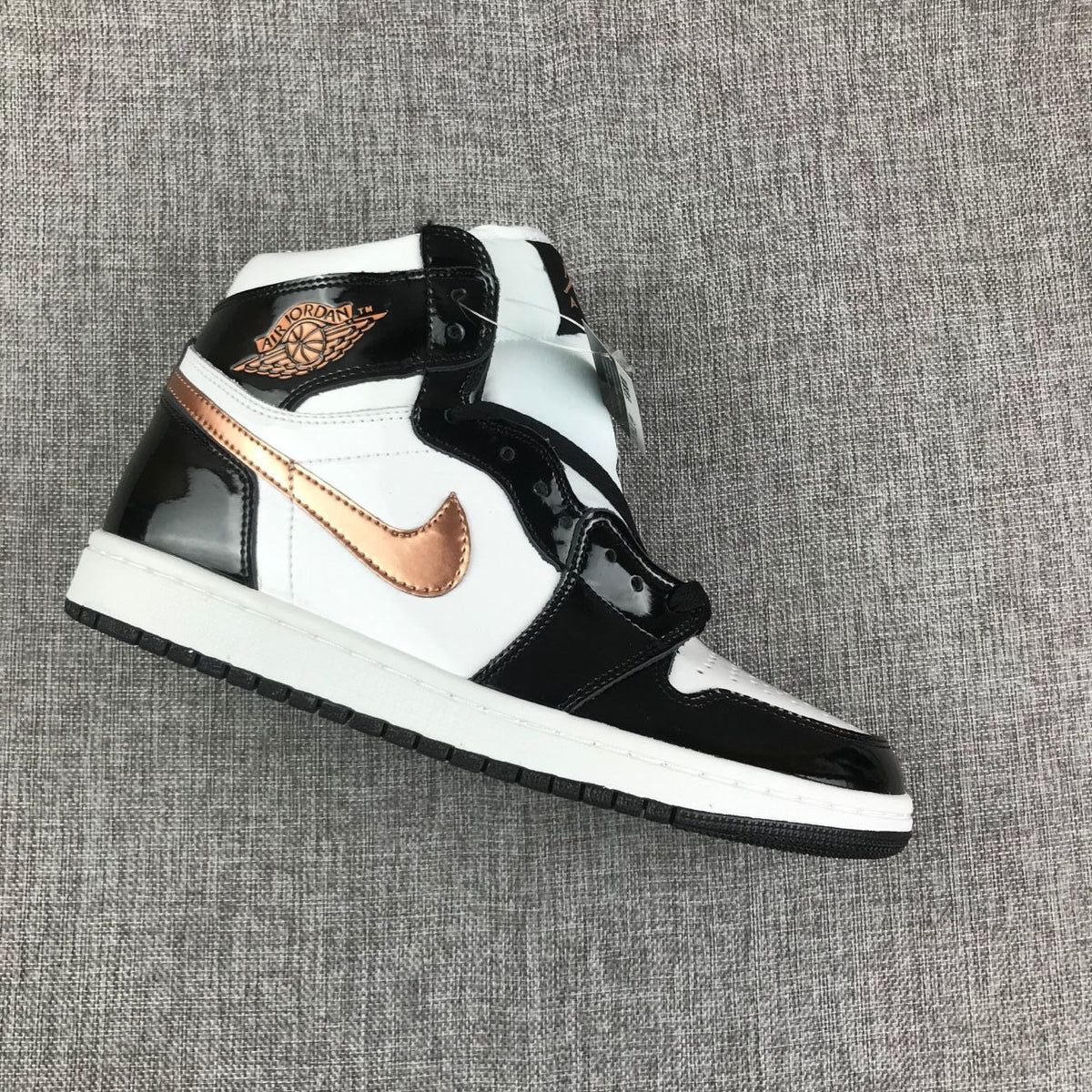 Air Jordan 1 High Black, White and Bronze Sneakers