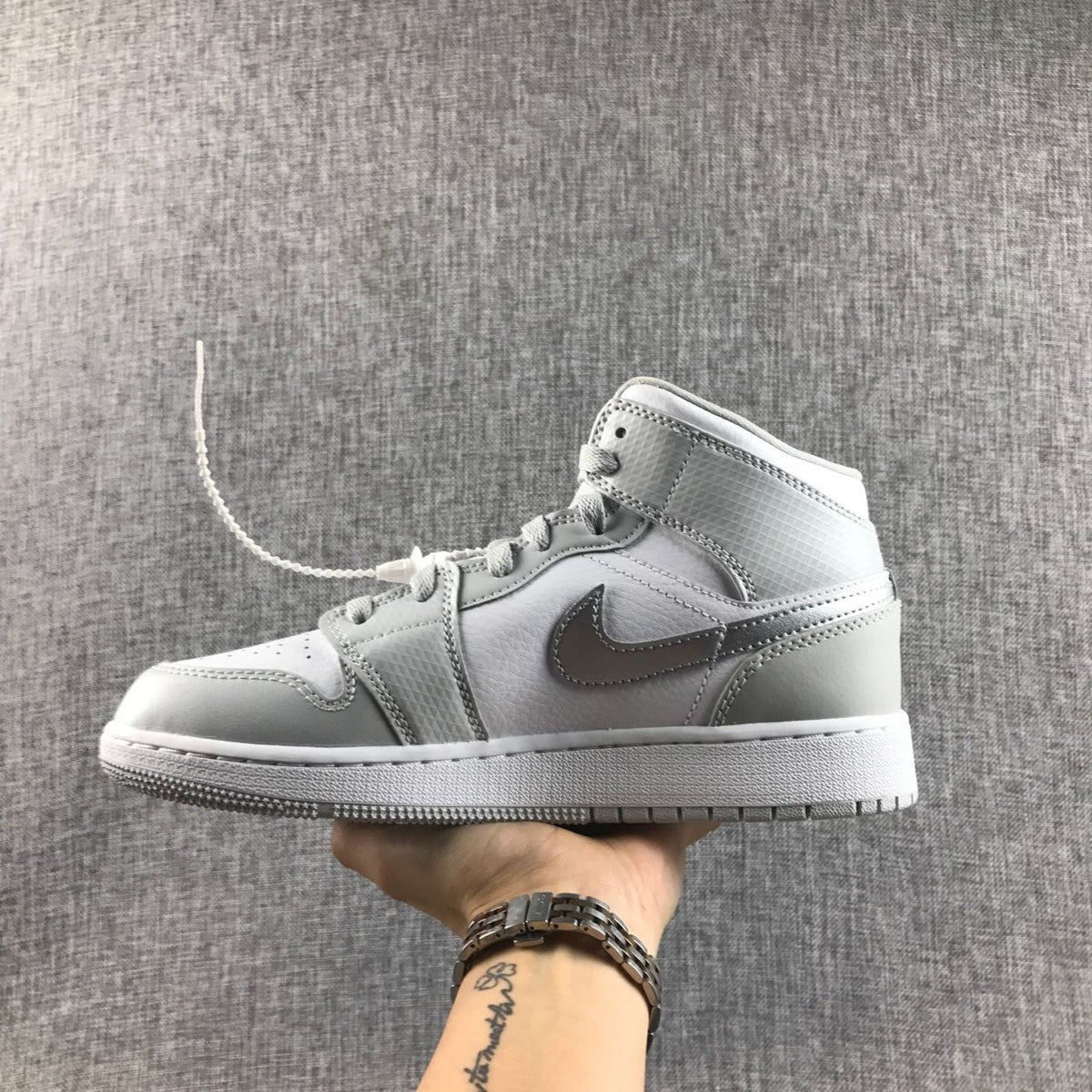 Jordan Air Jordan 1 Mid GS White and Silver Sneakers