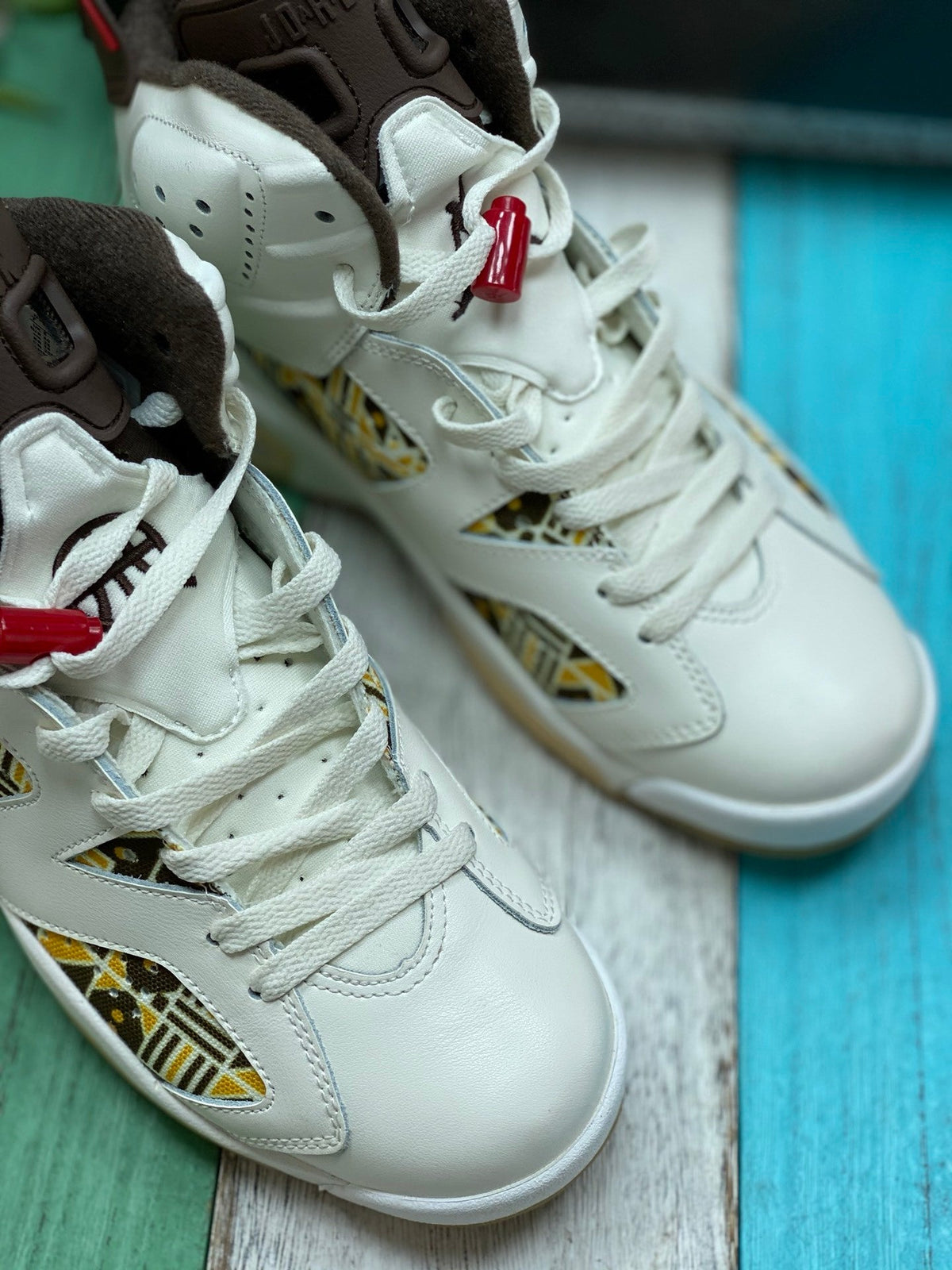Air Jordan 6 Quai 54 Sneakers in Sail and Brown