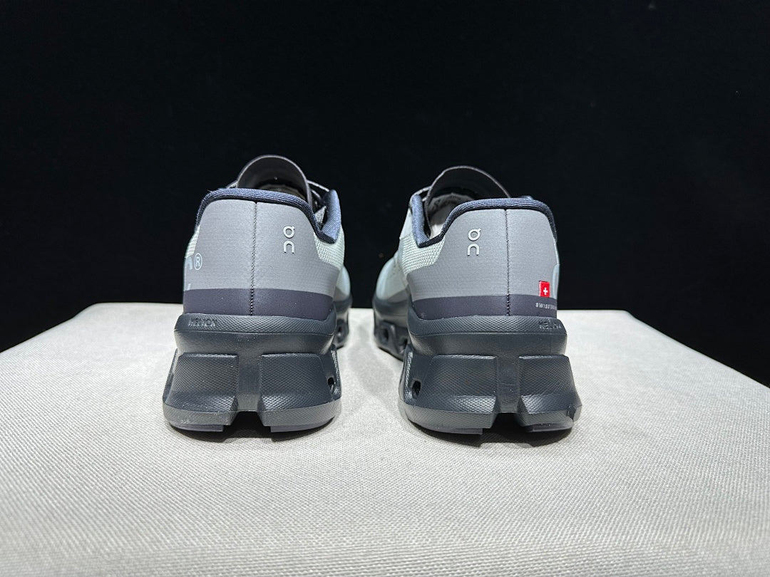 On Cloudmonster Running Shoes in Eclipse and Magnet