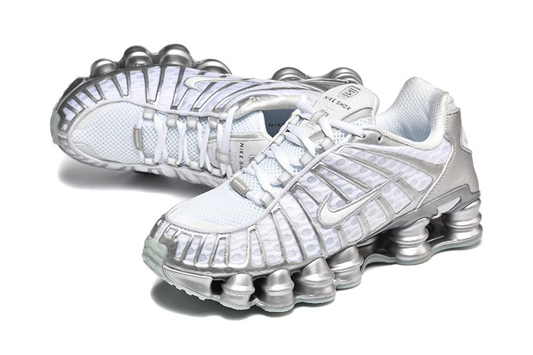 Nike Shox TL Sneakers in White and Metallic Silver