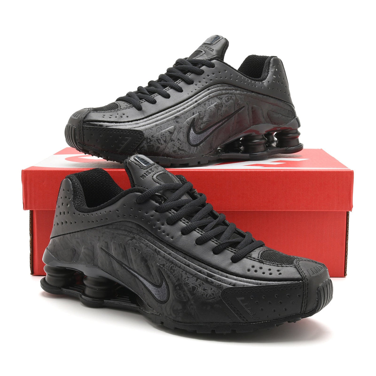 Nike Shox R4 All-Black Embossed Sneakers